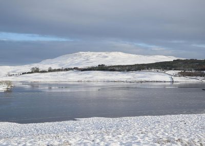 Loch Urr from the west shore looking South East to Castramon Hill. It is estimated that 3 or 4 turbines (up to 250m) will be visible.